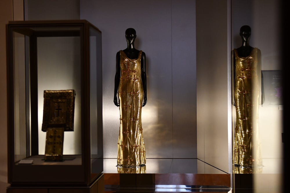 A golden dress from Versace at 'Louvre Couture'