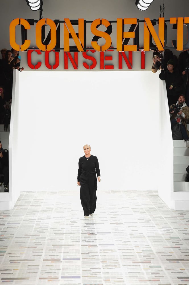Maria Grazia Chiuri takes a bow at her latest show for Dior's Autumn/Winter 2020 collection